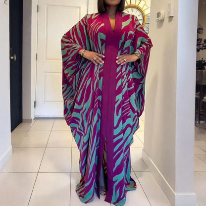 KARIN | MAXIKLÄNNING MED ZEBRAMÖNSTER