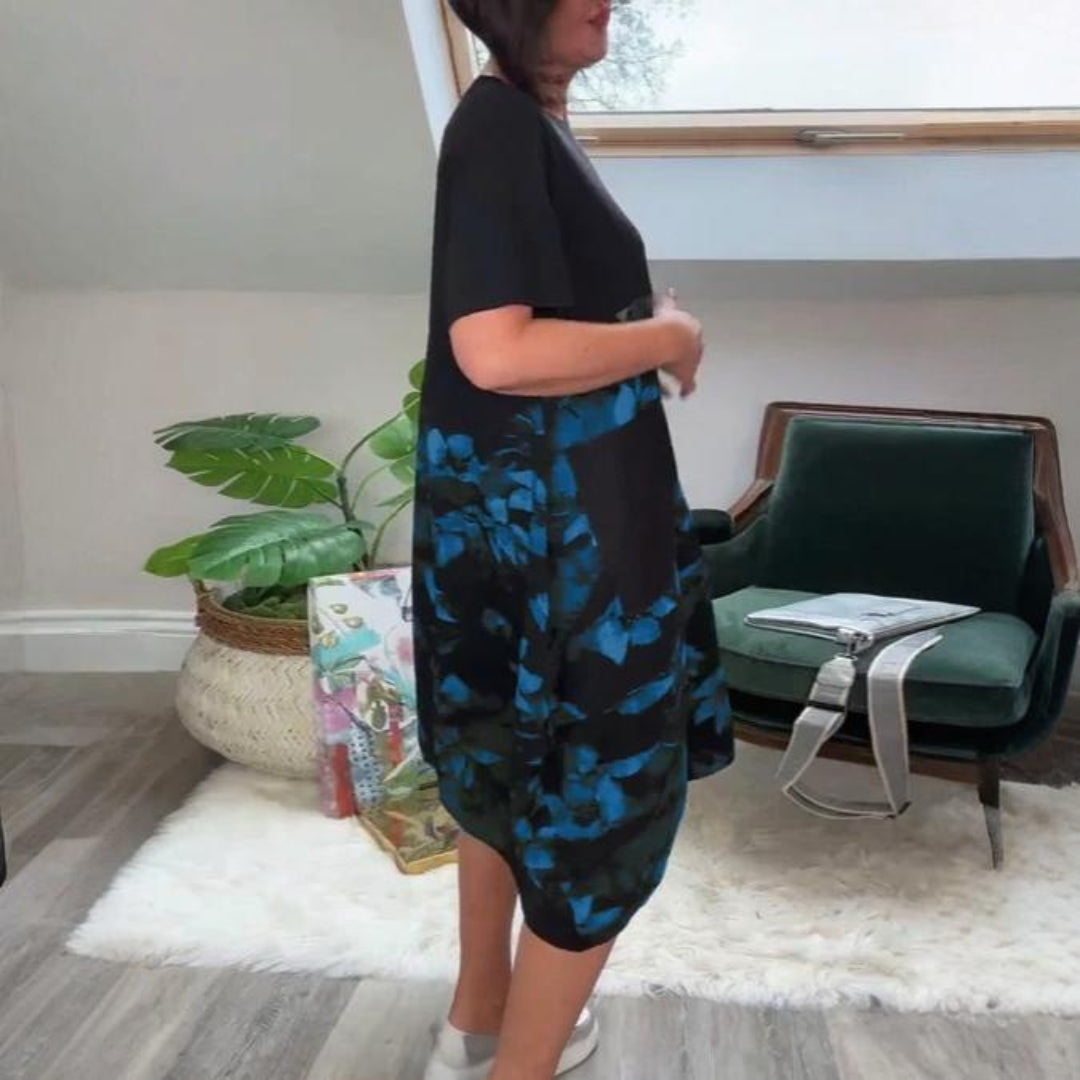 LOVISA | AVSLAPPNAD BLOMMIG KLÄNNING